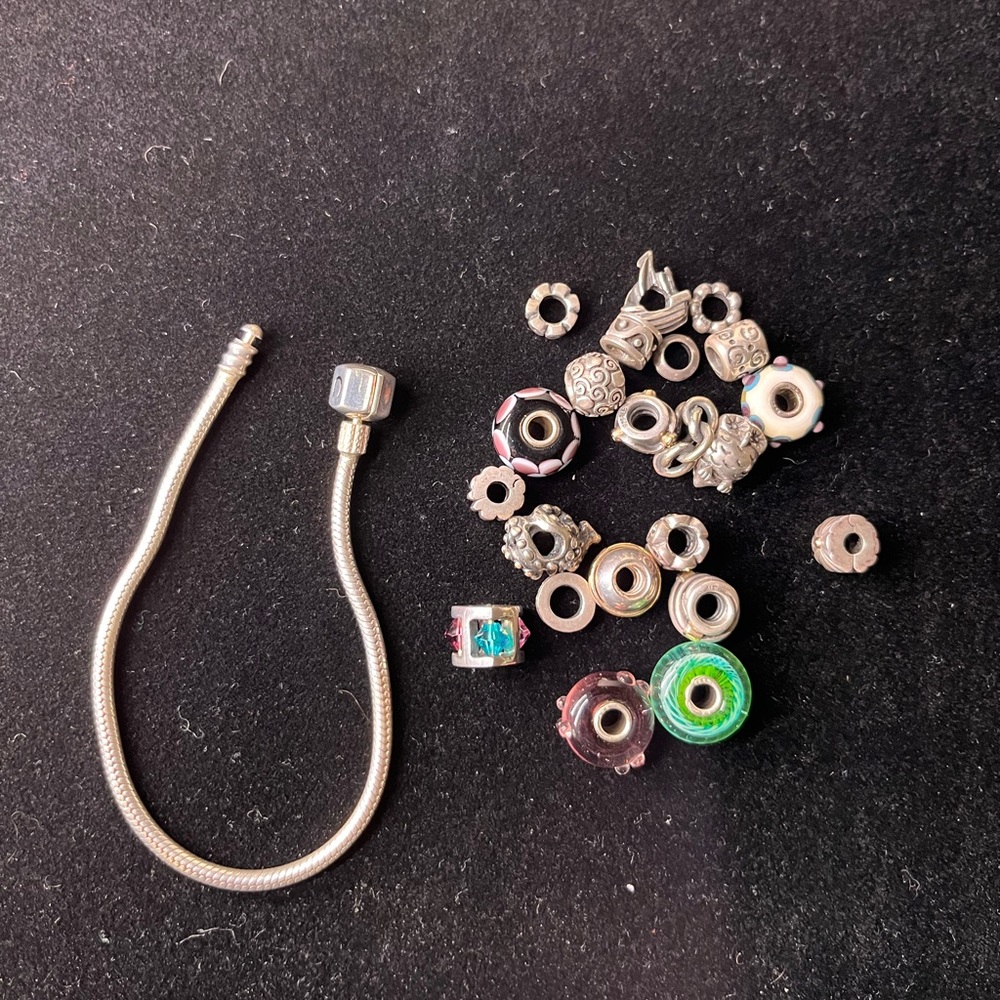 Assorted Pandora beads on a Sterling silver chain